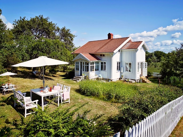 Una luminosa casa Country Chic donde relajarse