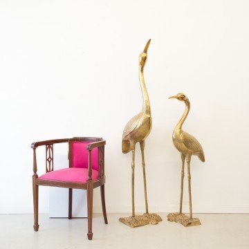 Pareja de grandes garzas de metal dorado