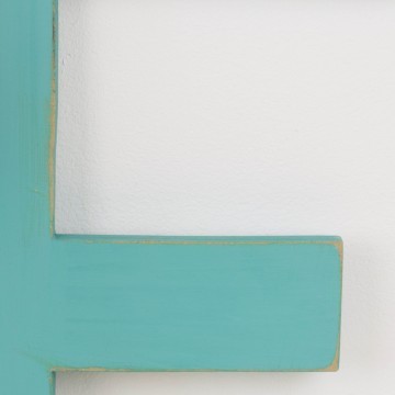 Letra E en color aguamarina
