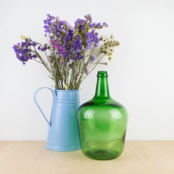 Damajuana pequeña de vidrio verde