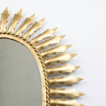 Antiguo espejo sol ovalado