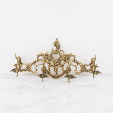 Perchero dorado de pared